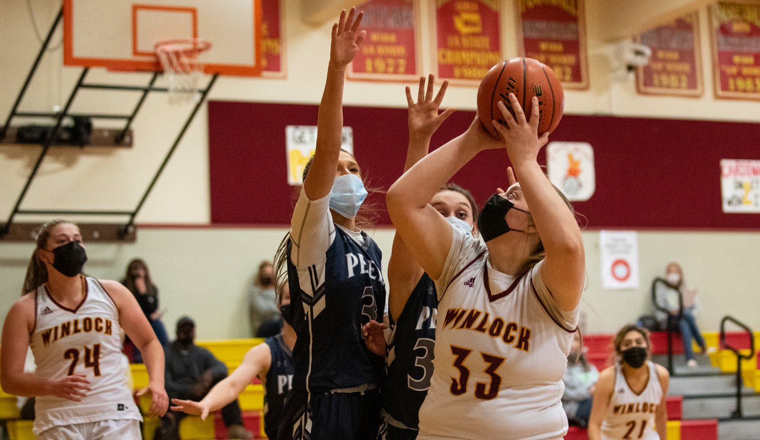 Winlock's Rylei Krusmark looks for a shot down low against Pe Ell on Saturday.