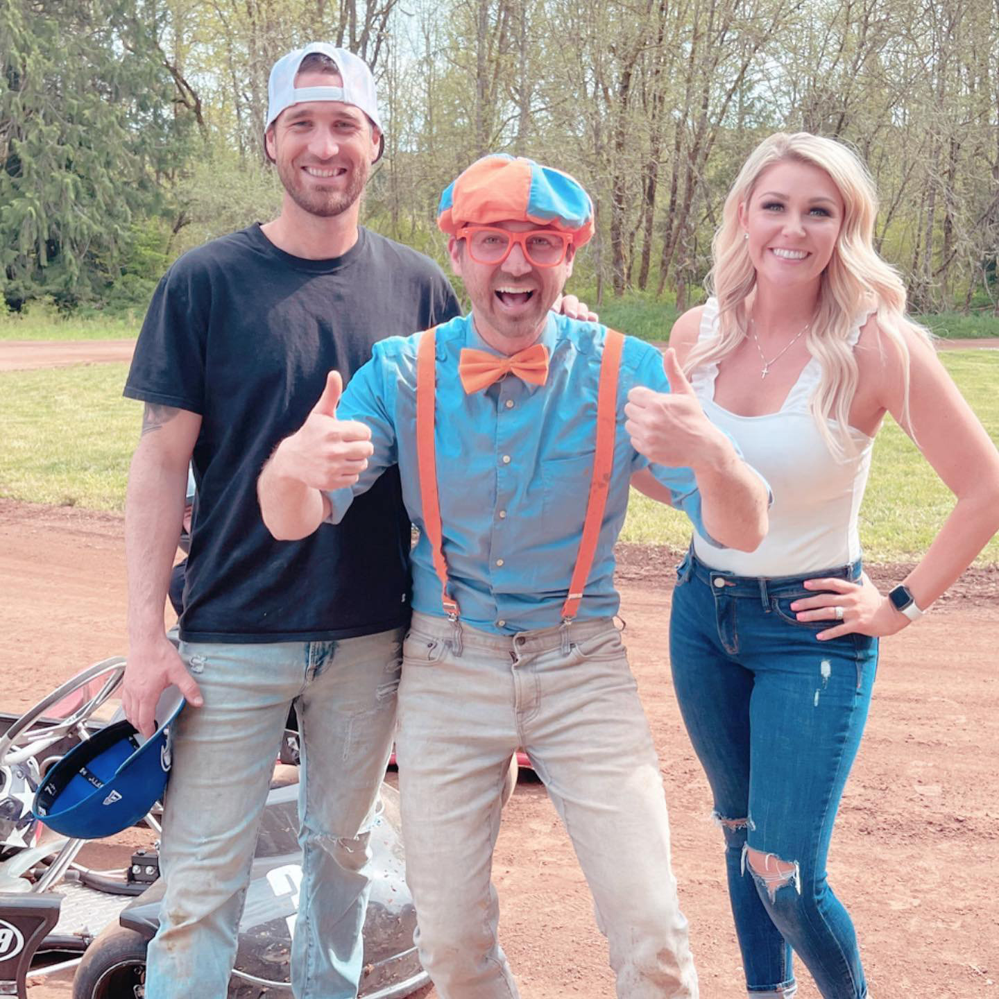 Ross Johnson, Blippi and Jade Johnson pose for a photo during the entertainer's visit to Tenino last week.