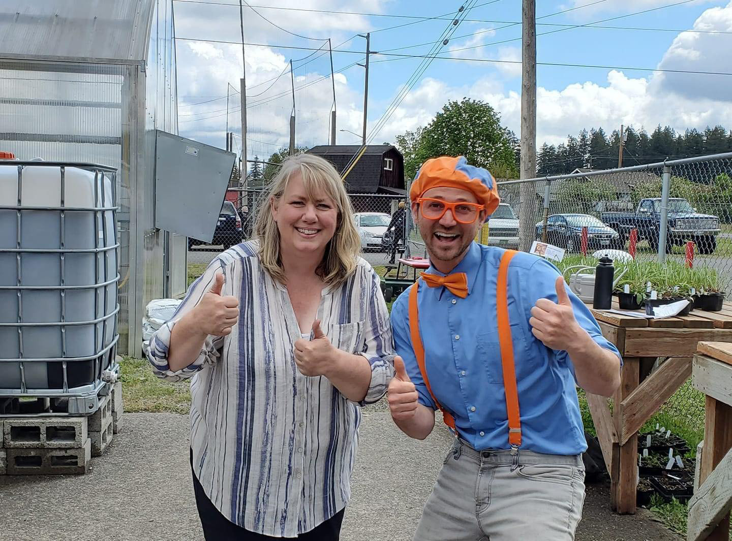 Tenino High Sschool teacher and FFA adviser Geraldine “Pete” Maxfield poses with Blippi during his visit to the city last week.