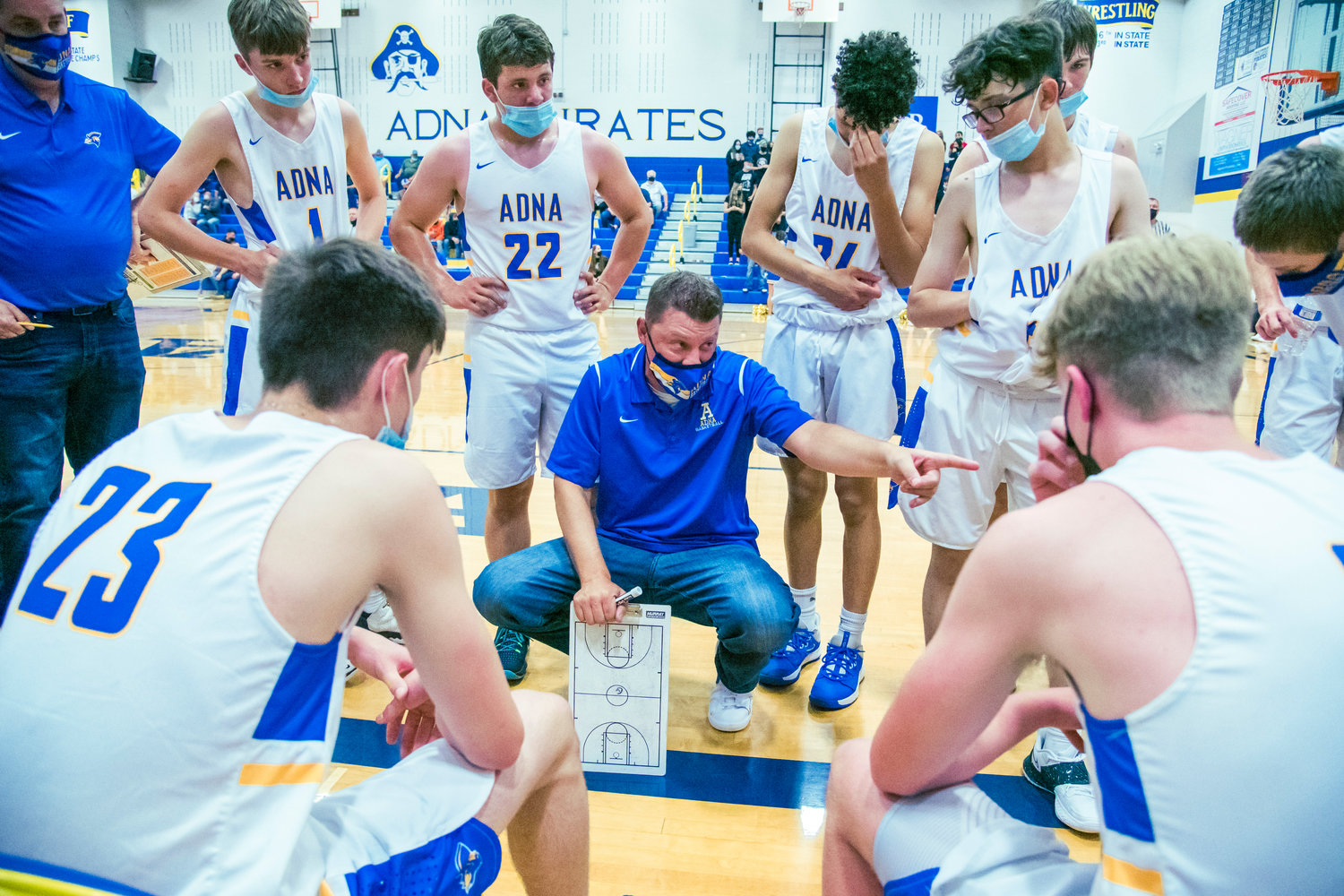 Adna’s Head Coach Luke Salme talks to players during a game against MWP on Tuesday.