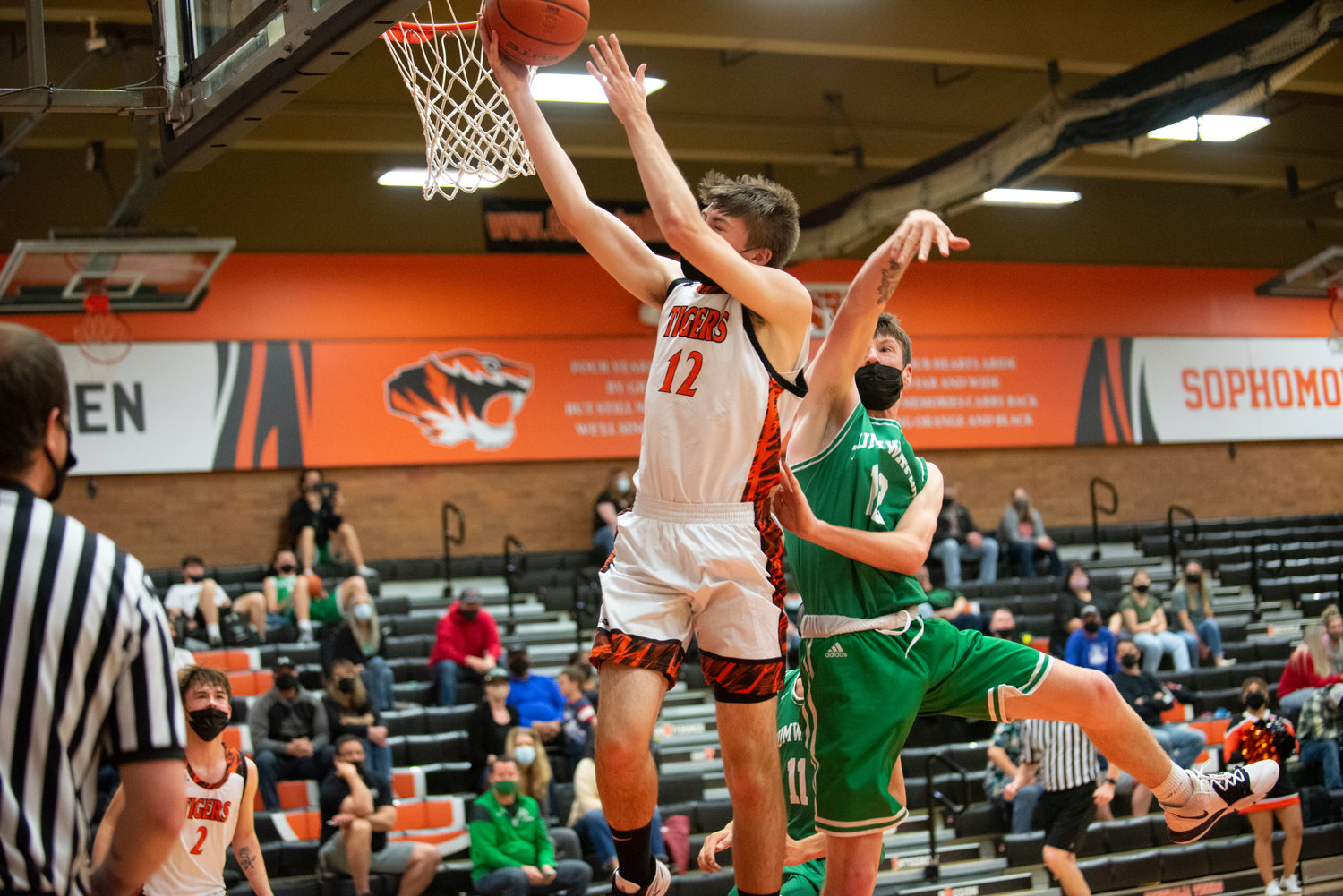 Centralia junior Landon Kaut (12) goes up for two points against Tumwater Wednesday at home.