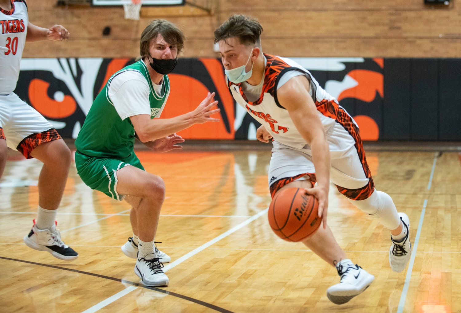 Centralia senior Cameron Erickson drives to the bucket against a Tumwater defender on Tuesday at home.