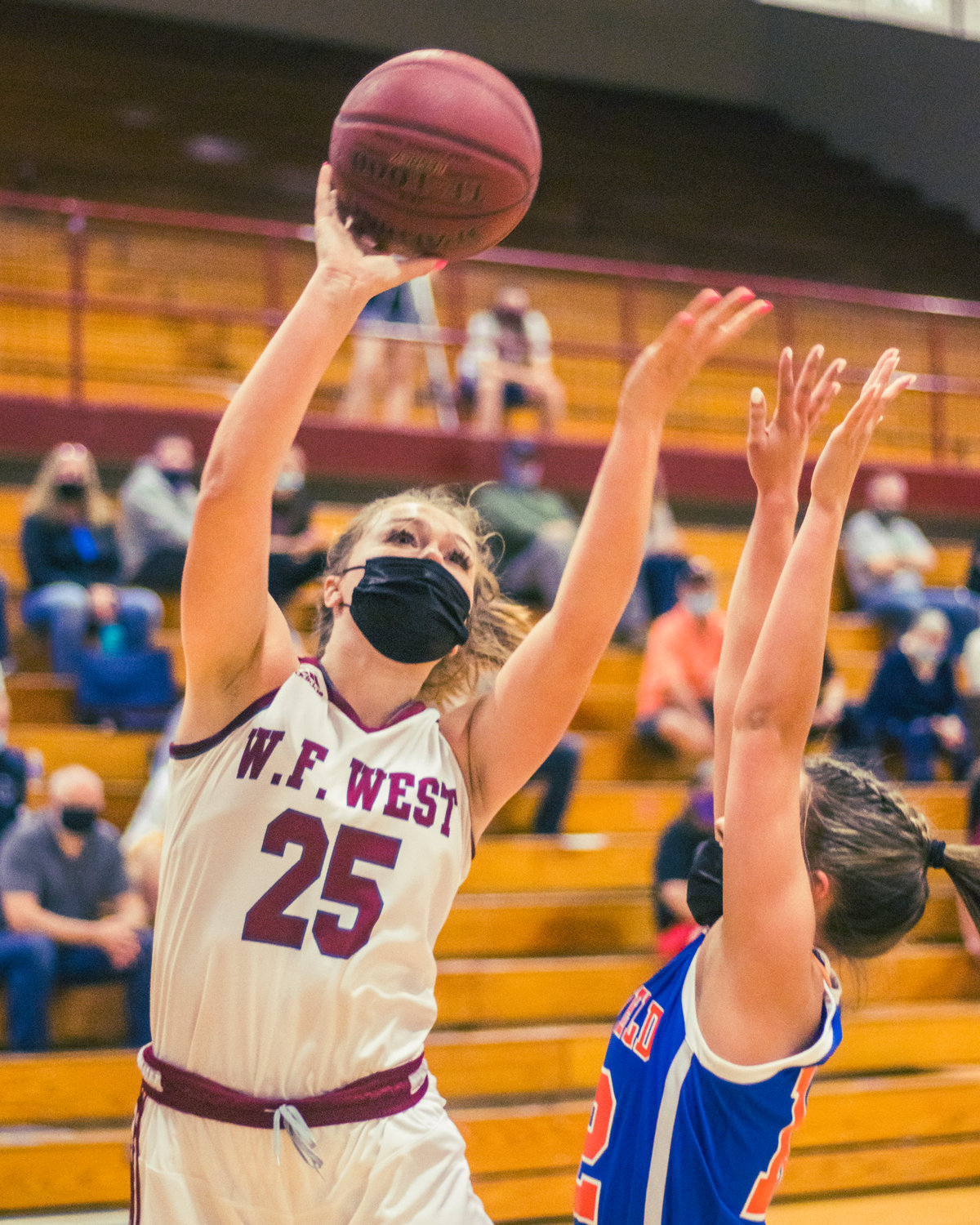 W.F. West's Kayla McCallum (25) goes up for a shot during a game against Ridgefield in Chehalis Wednesday night.
