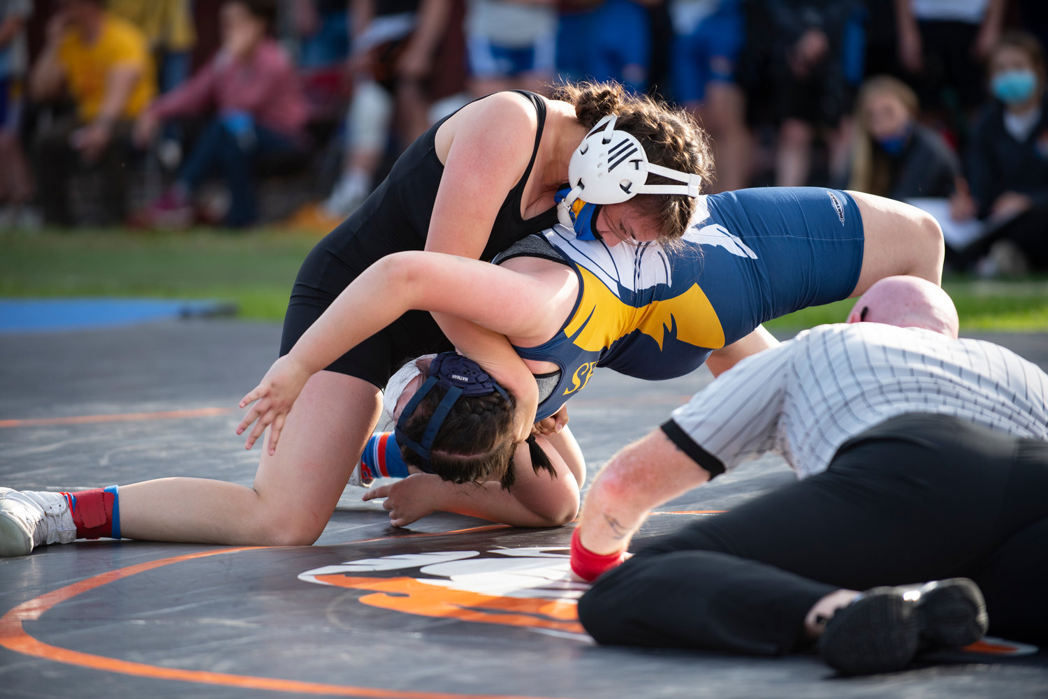 FILE PHOTO - Adna's Keaton Dowell, in the black singlet, prepares to pin a Forks wrestler on Thursday.