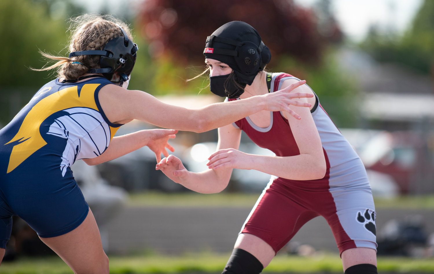 W.F. West's Bailee Kambich, right, prepares to tie up with a Forks wrestler on Thursday in Napavine.