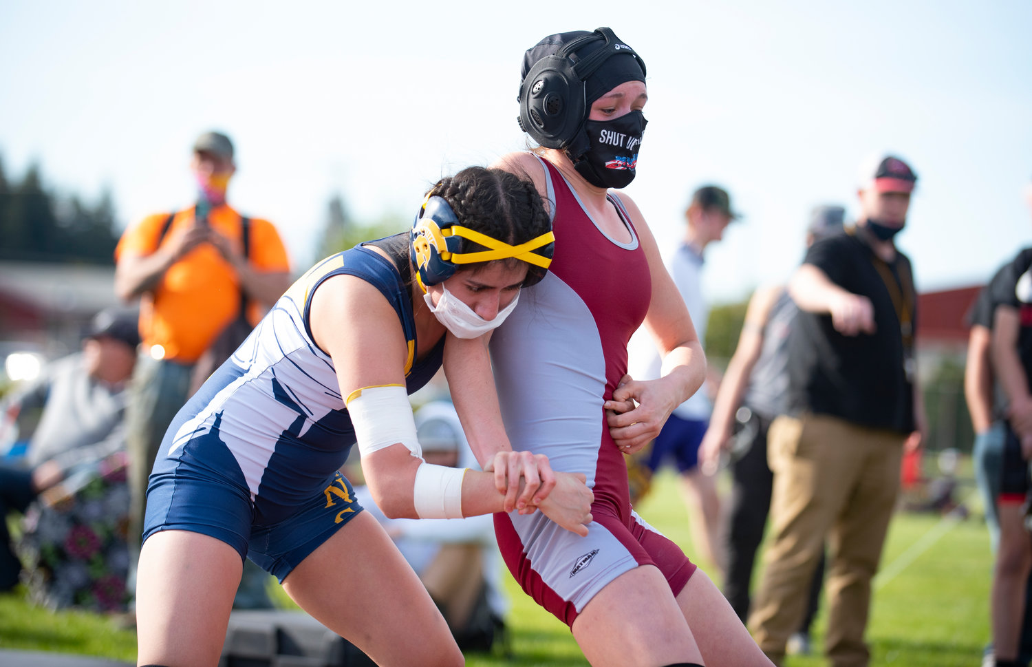 W.F. West's Abbi Armstrong, right, looks to escape a Forks wrestler on Thursday.