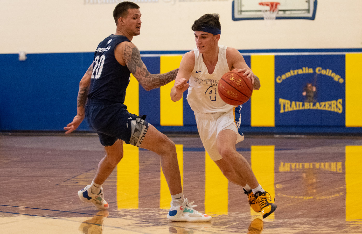 Centralia College guard Kayden Kelly (3) drives against a Tacoma defender.