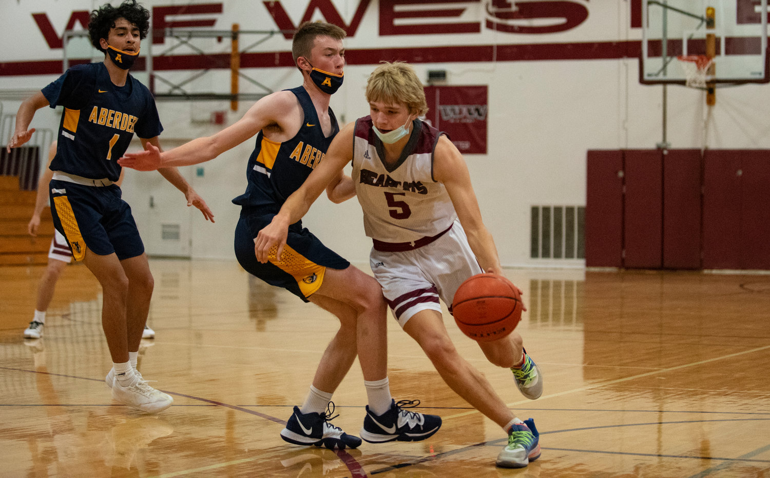W.F. West junior Dirk Plakinger drives around an Aberdeen defender during the second quarter of Saturday's game.