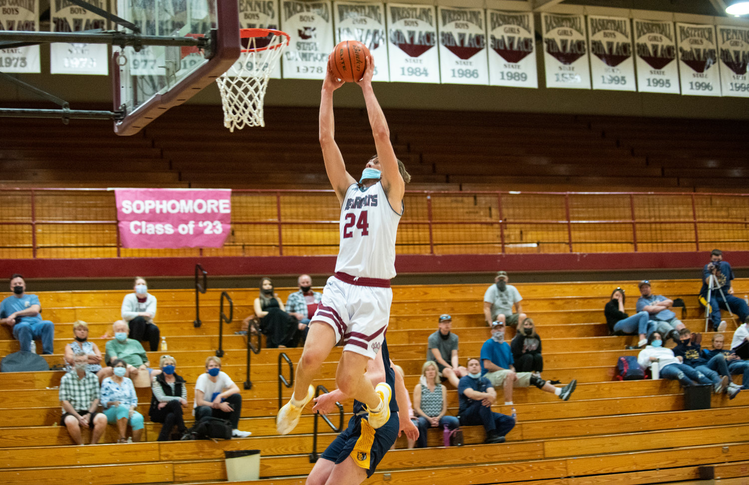 W.F. West senior Carter McCoy soars for a two-handed jam against Aberdeen on Saturday.