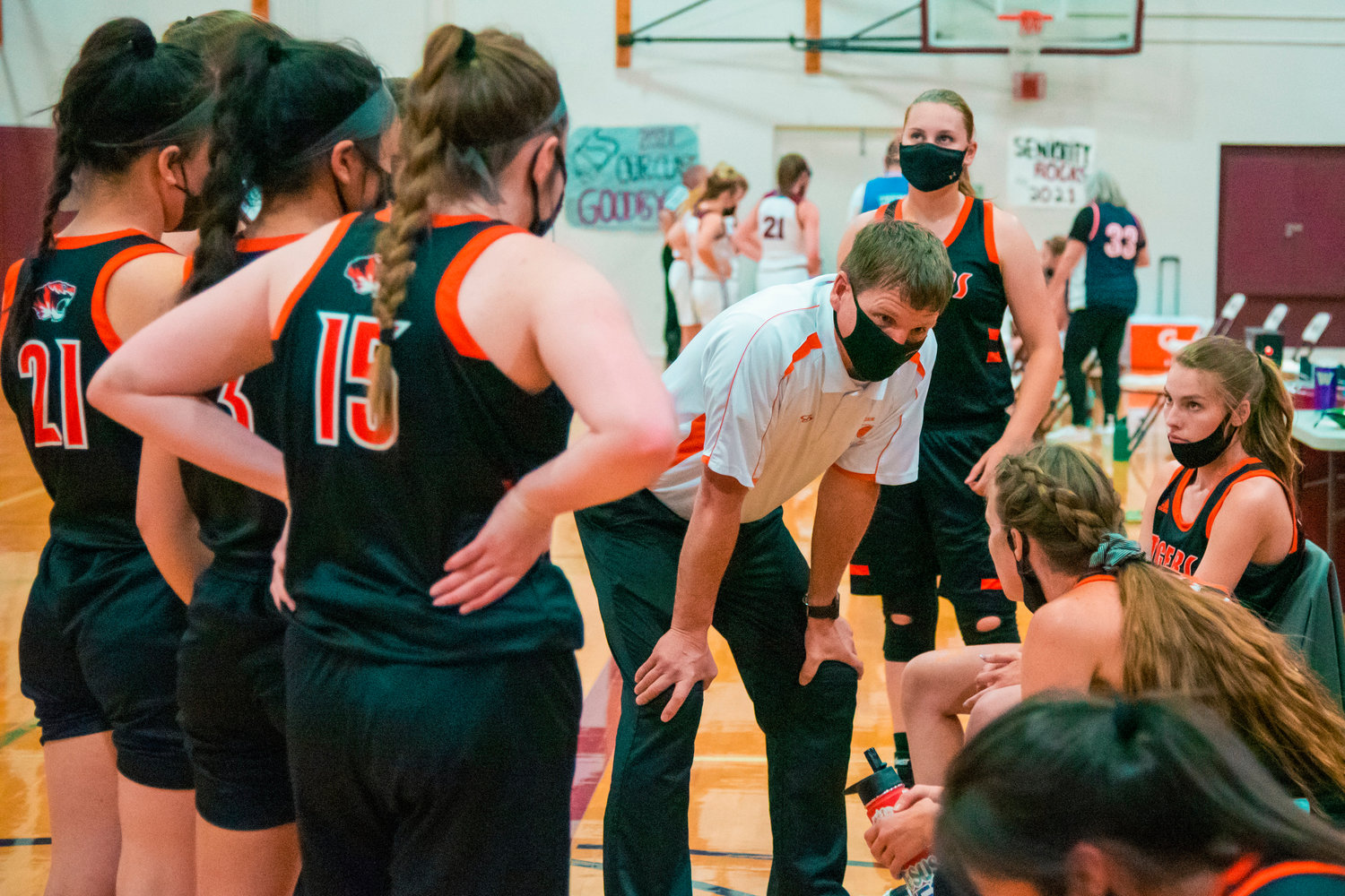 Centralia’s Head Coach Doug Ashmore talks to players during a game against the Bearcats played Monday night in Chehalis.