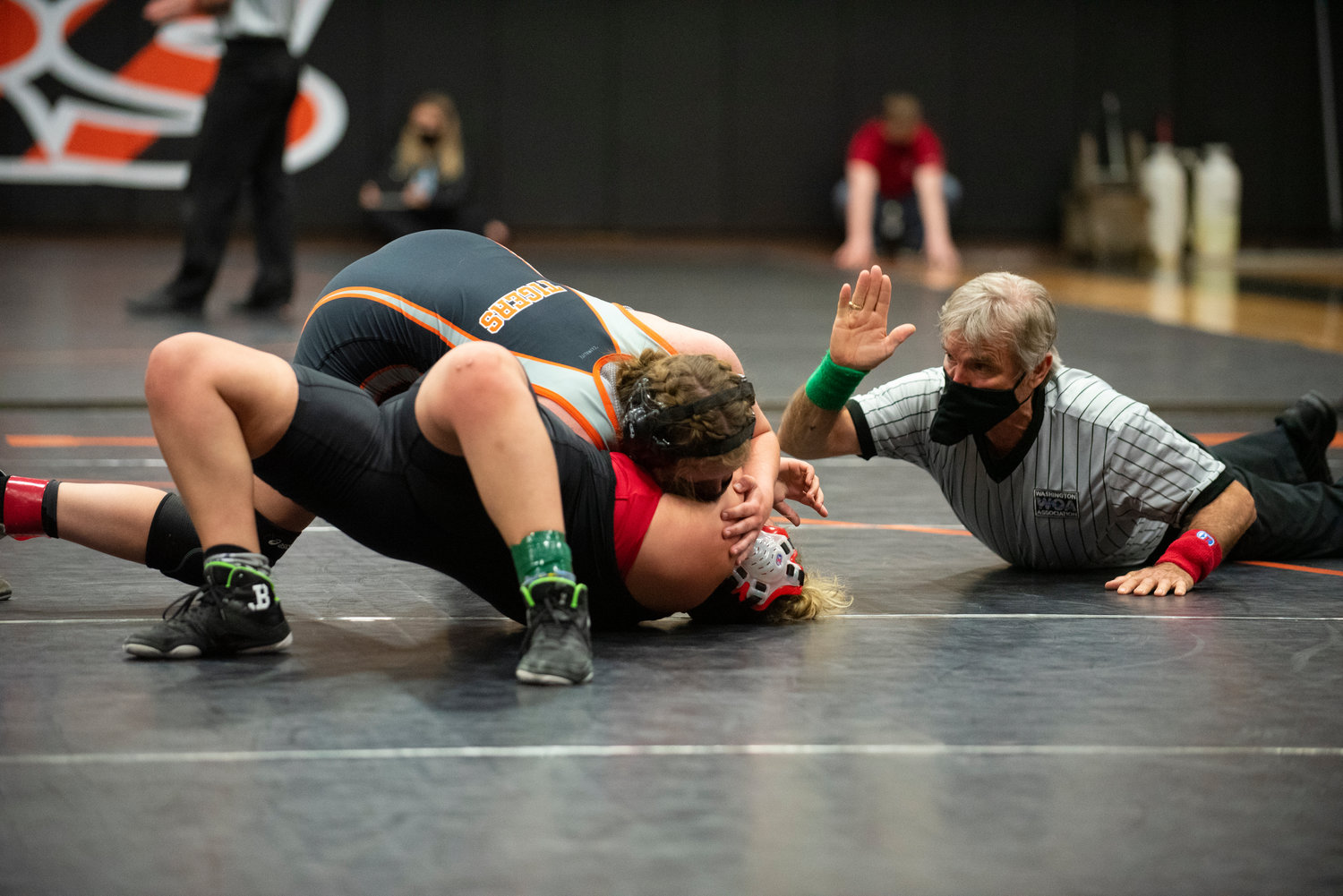 Centralia's Maya Kunkel, top, pins a Black Hills opponent in her first match of a six-team wrestling meet Tuesday in Centralia.