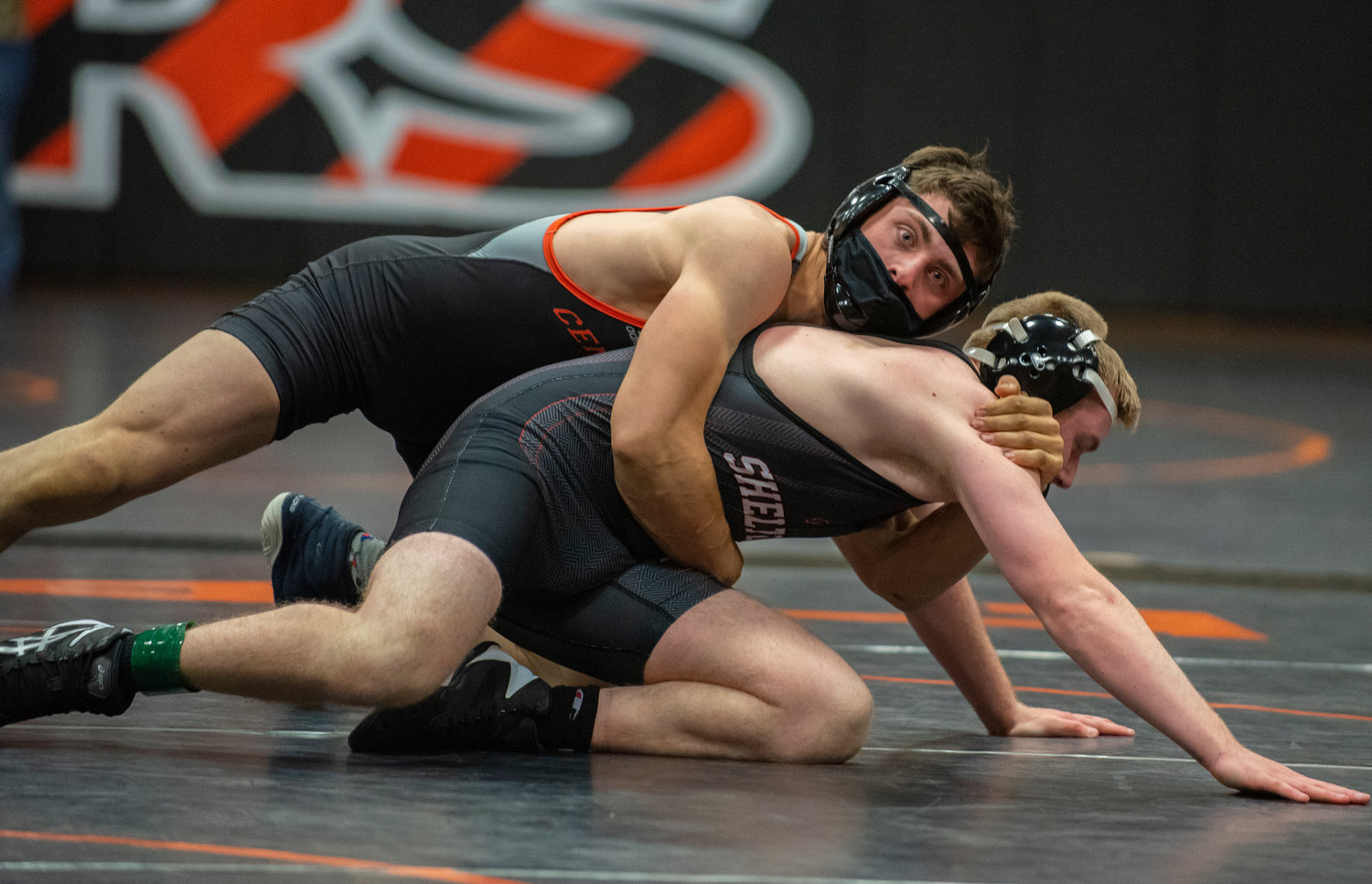 Centralia senior Sawyer Kassell wrestles a Shelton opponent in the 170-pound division at a wrestling meet in Centralia Tuesday. Kassel won by pin.