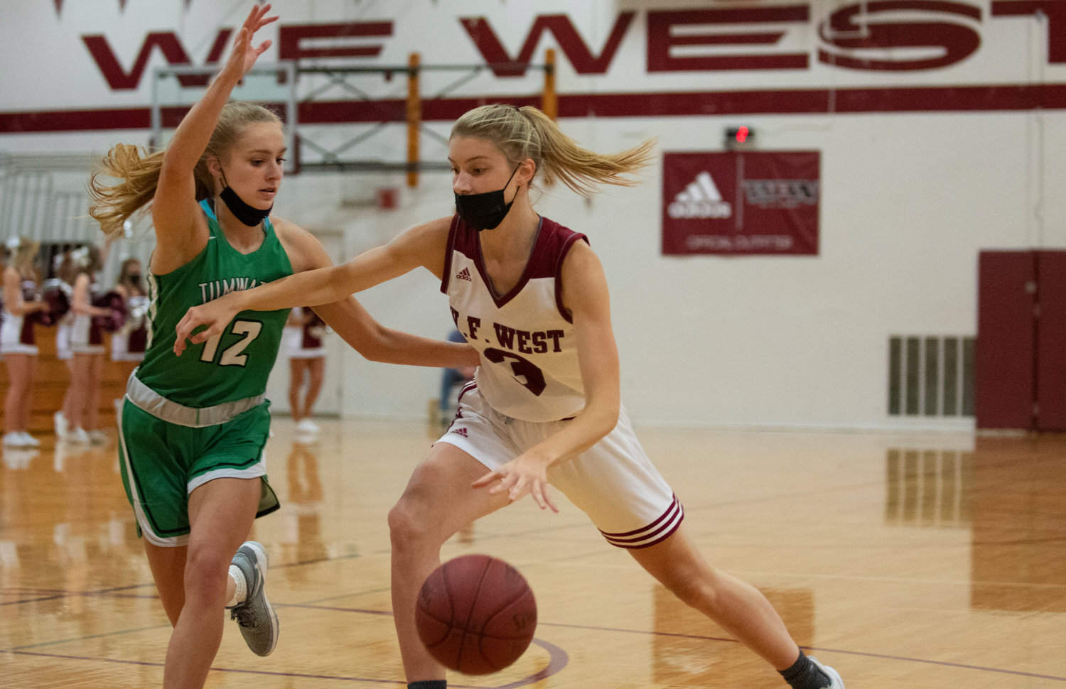 W.F. West's Lexi Roberts (3) drives against Tumwater's Aubrye Amendala (12) on Monday.