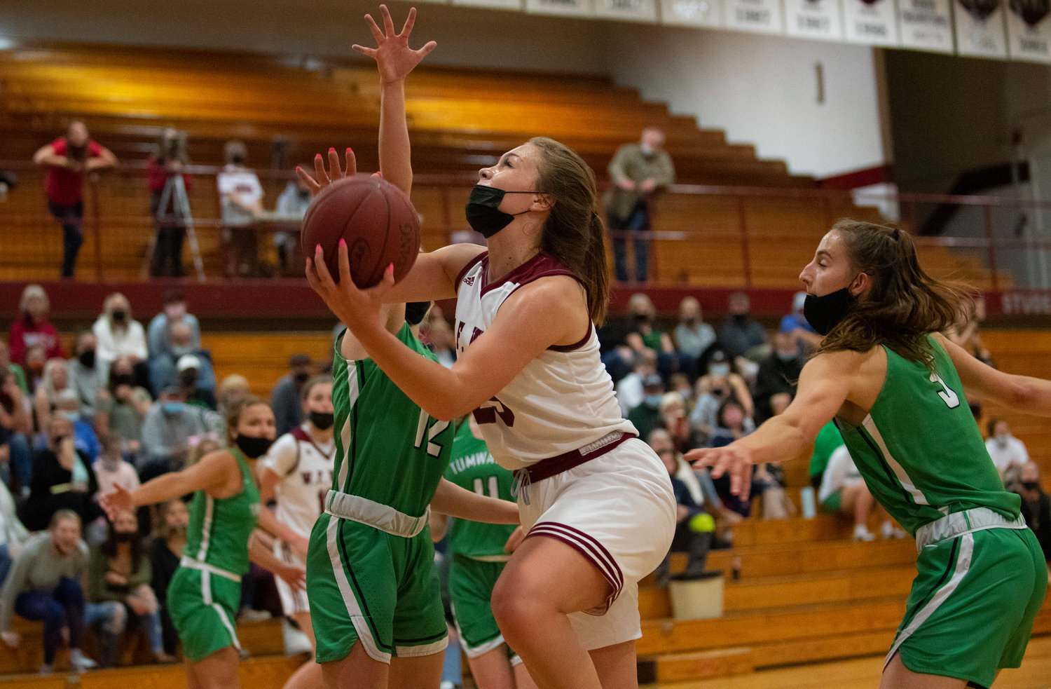 W.F. West's Kyla McCallum drives past two Tumwater defenders on Monday.