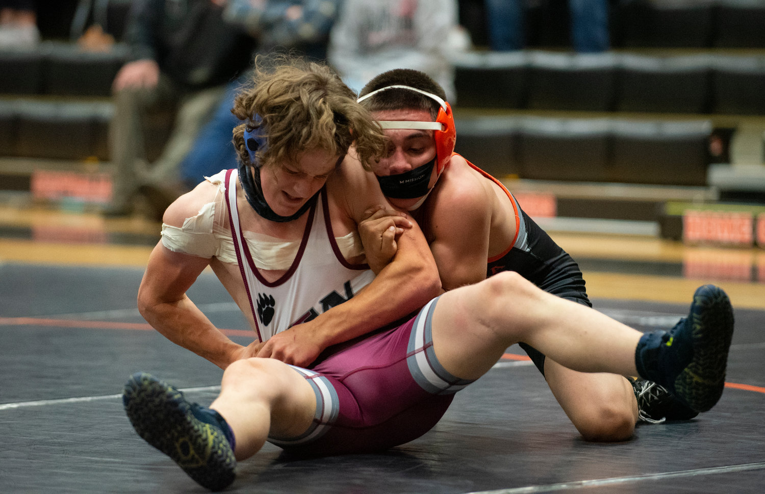 Centralia freshman Antonio Campos, right, grapples with W.F. West's Caden Cunningham on Tuesday.