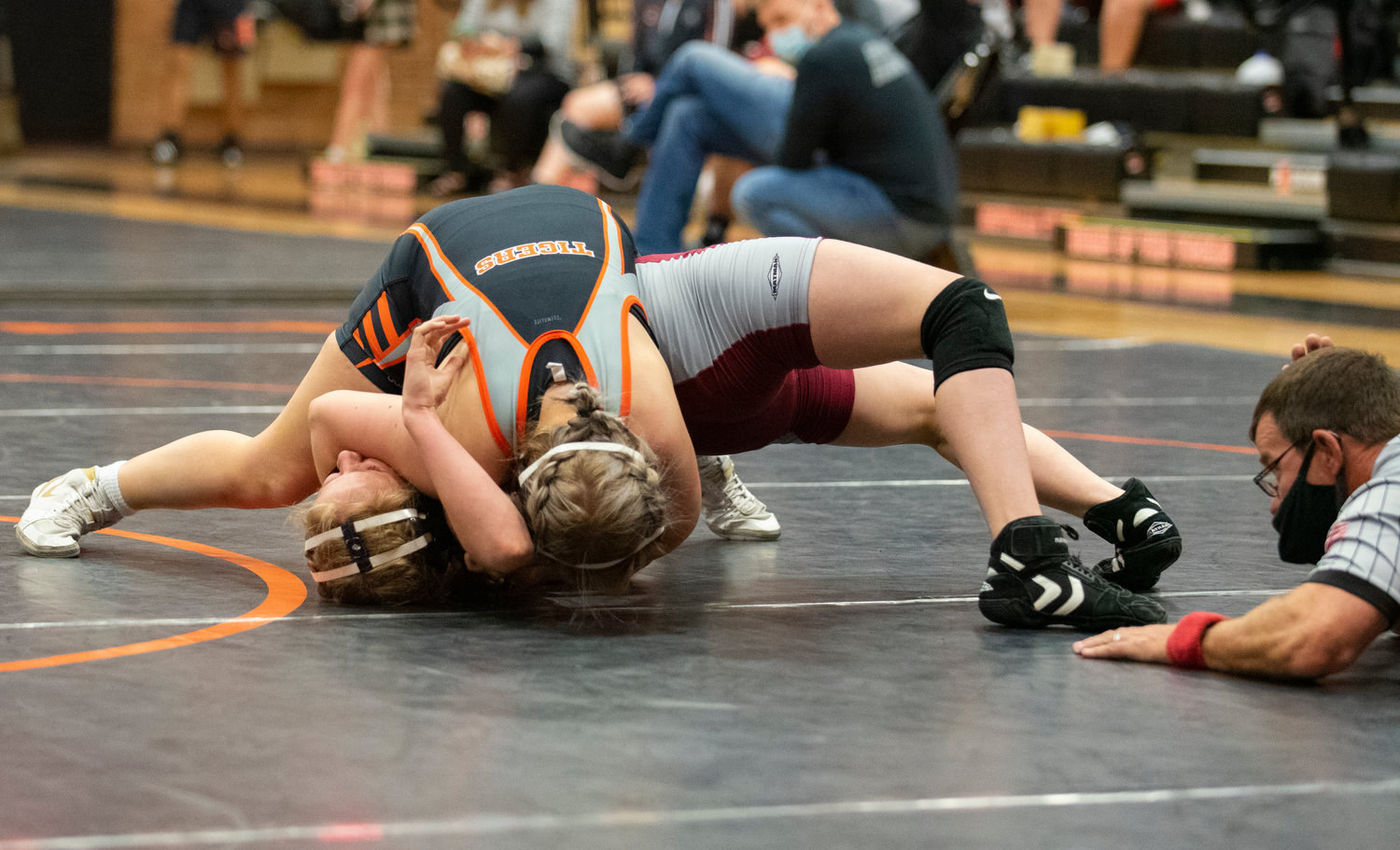 Centralia's Analeese McAllister, top, pins a W.F. West wrestler on Tuesday.