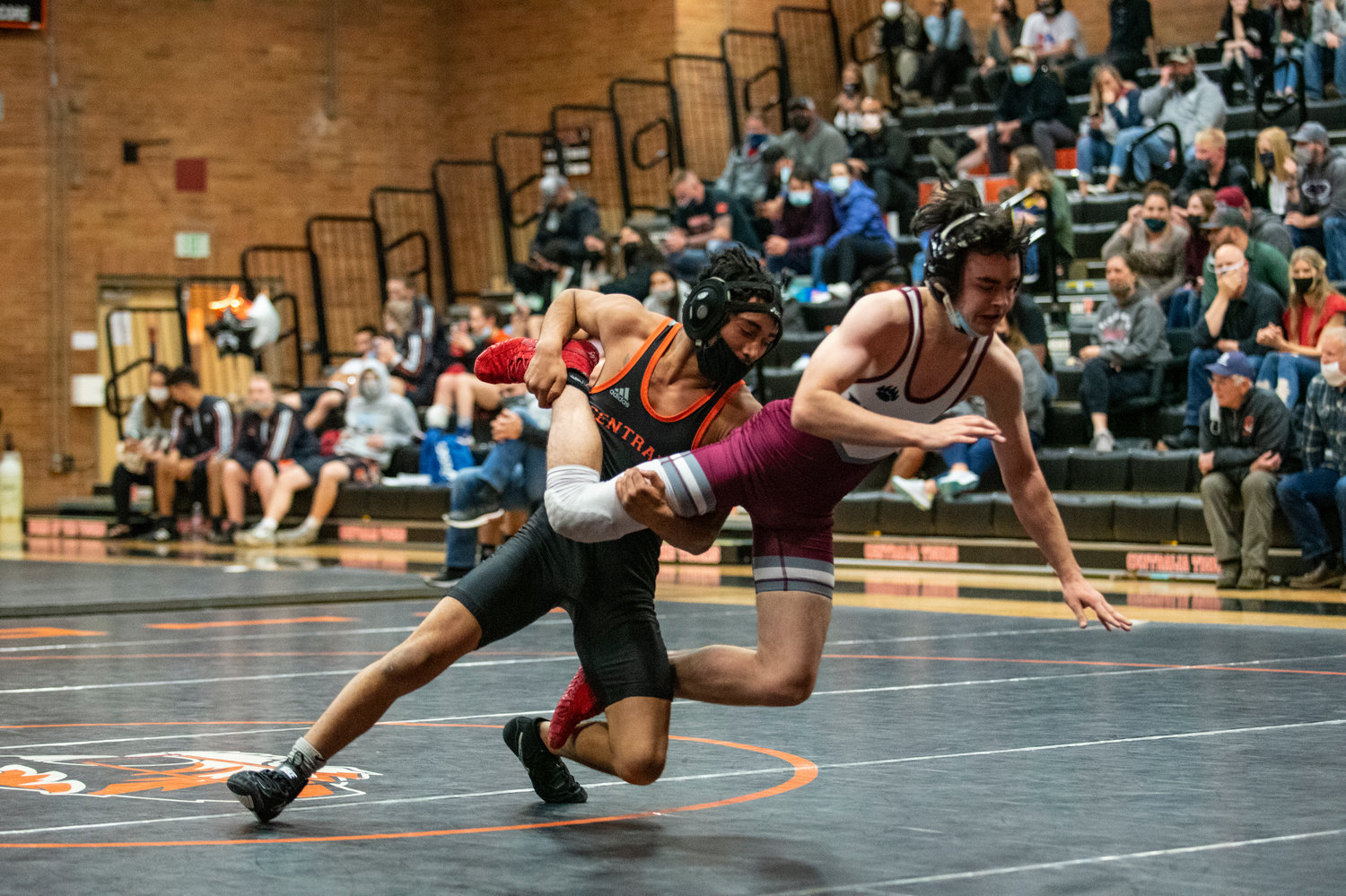 Centralia's Jamal Waterman, left, takes down W.F. West's Hunter Arnett in a mix-and-match battle on Tuesday.
