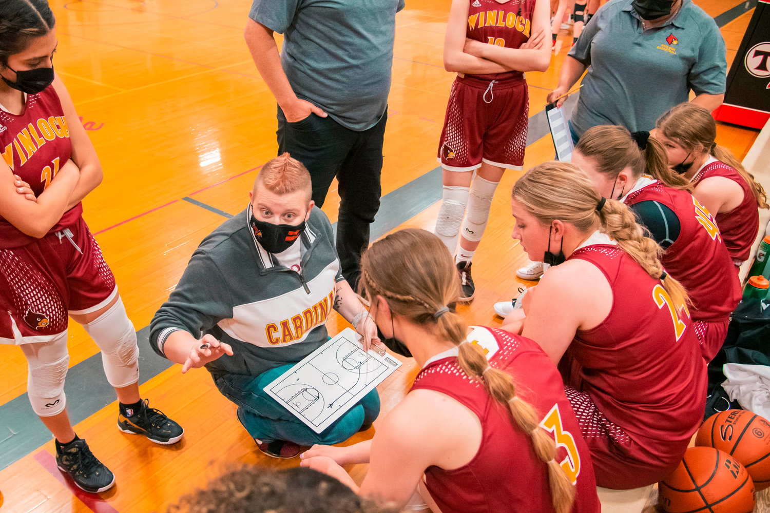 Winlock’s Head Coach Tori Nelson talks to players during a game against Toledo on Tuesday.