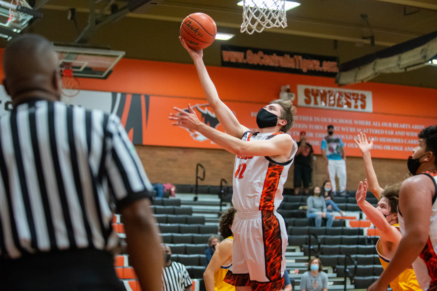 Centralia junior Landon Kaut (12) soars for two points against Rochester at home on Wednesday.
