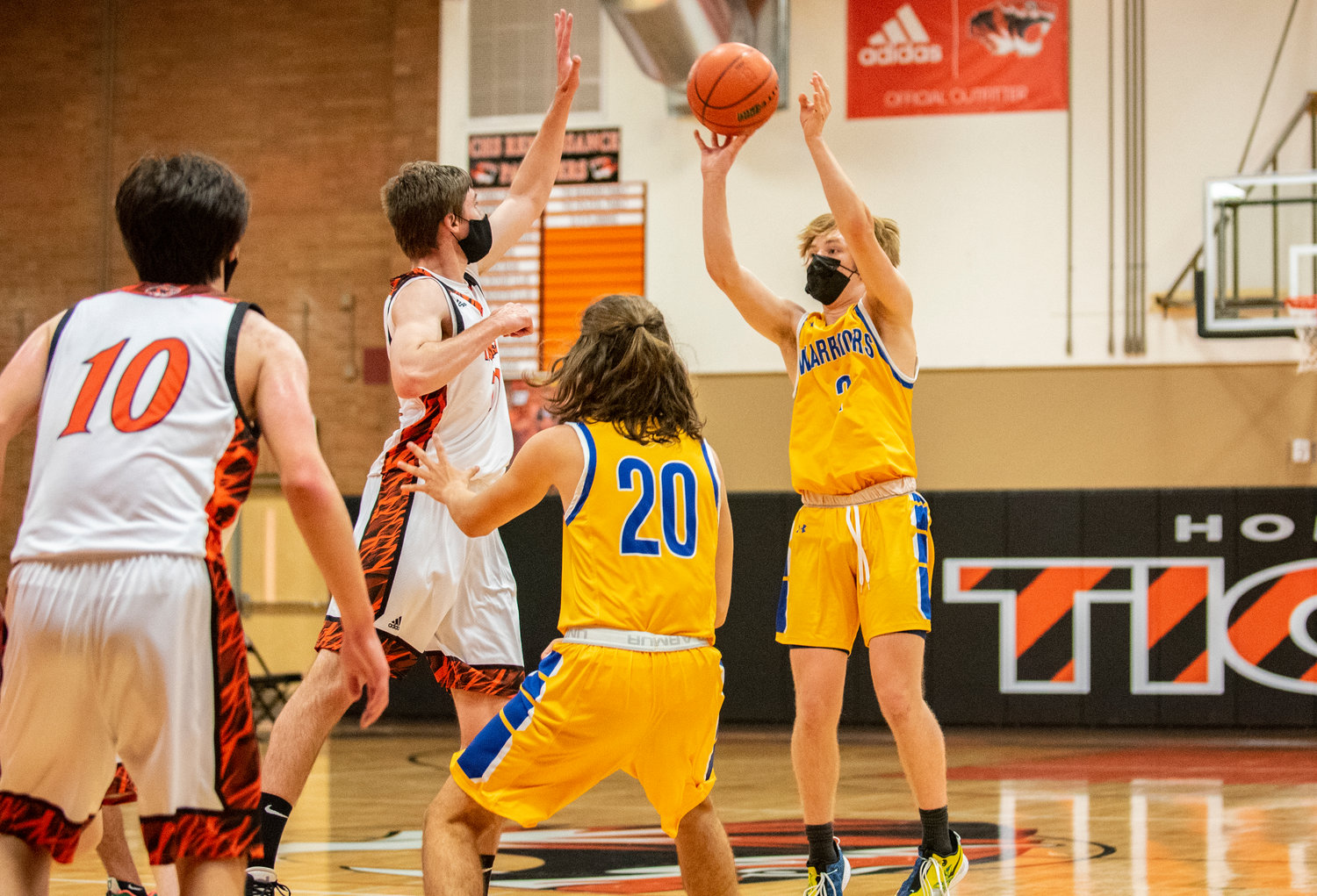 Rochester's Ben Crouse (2) shoots a 3-pointer over Centralia's Rex Akins on Wednesday.