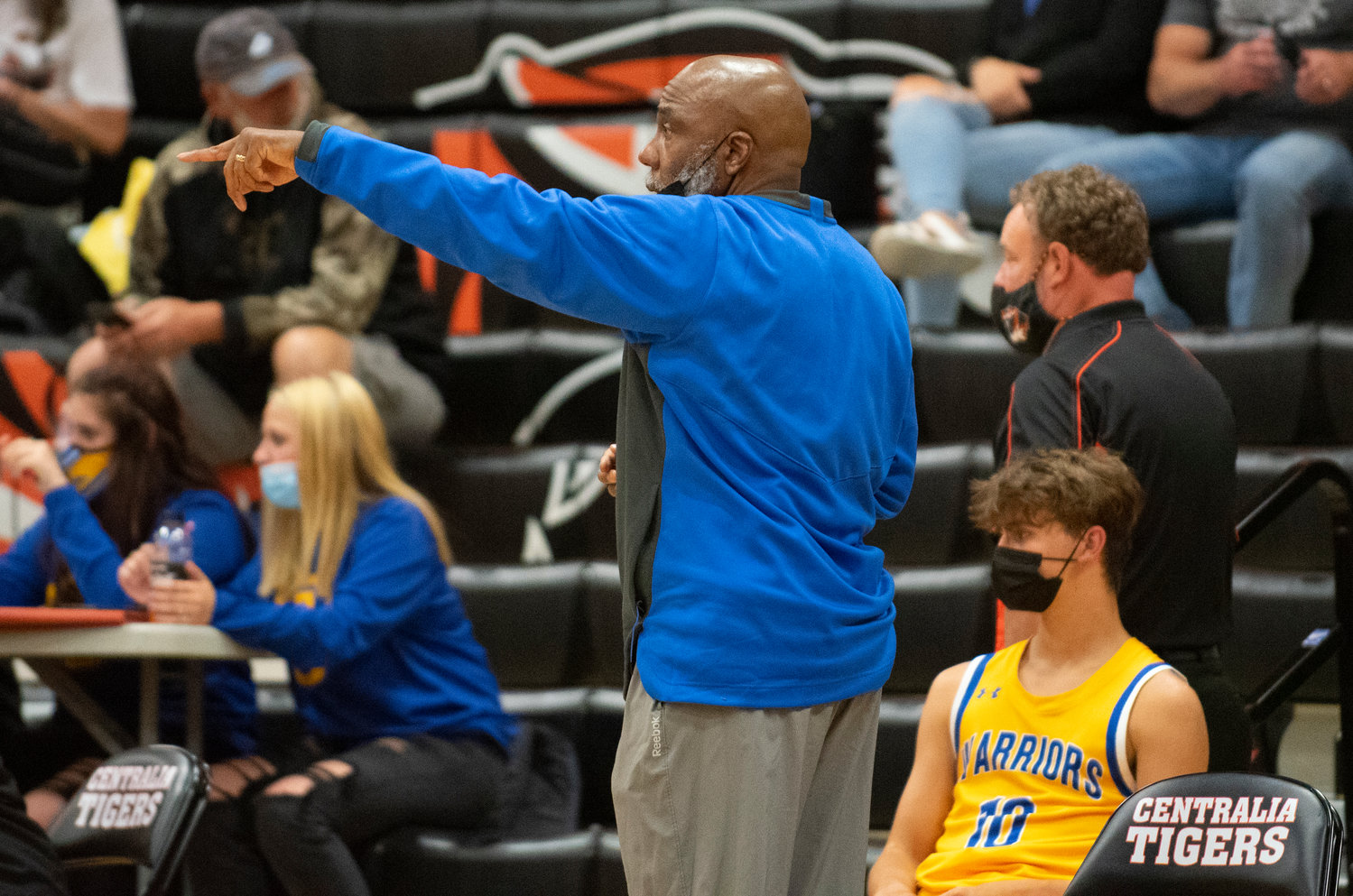 Rochester coach Derrick Pringle calls out instructions to the Warriors in a game against Centralia on Wednesday.