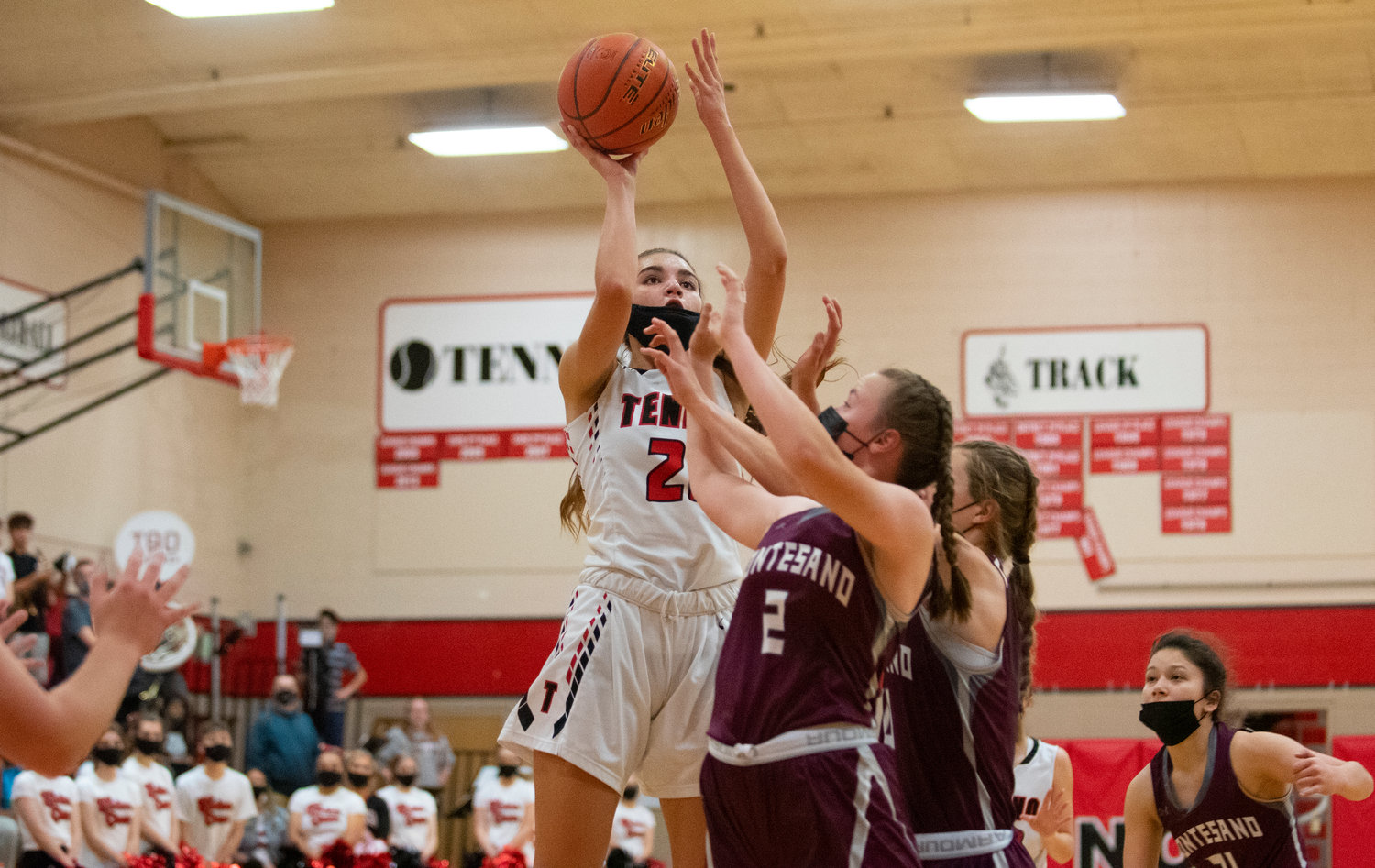 Tenino junior Ashley Schow shoots over a Montesano double team in a 1A Evergreen Conference matchup Thursday in Tenino.