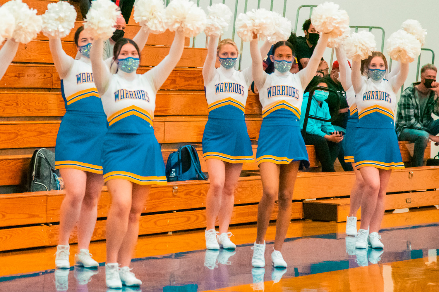 Rochester cheerleaders cheer during a home game against Shelton on Friday.