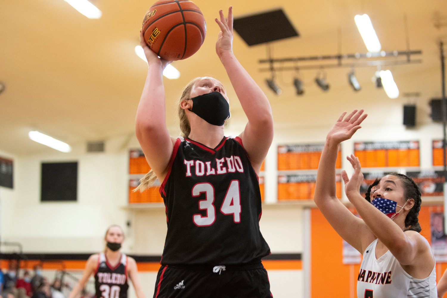 FILE PHOTO - Toledo senior Stacie Spahr (34) goes up for two points in the paint against Napavine earlier this season.