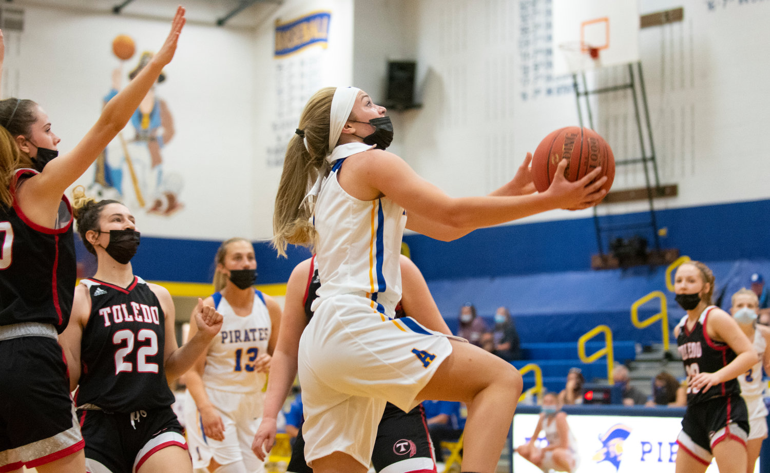 Adna's Kaylin Todds breaks free for an uncontested layup against Toledo on Thursday.
