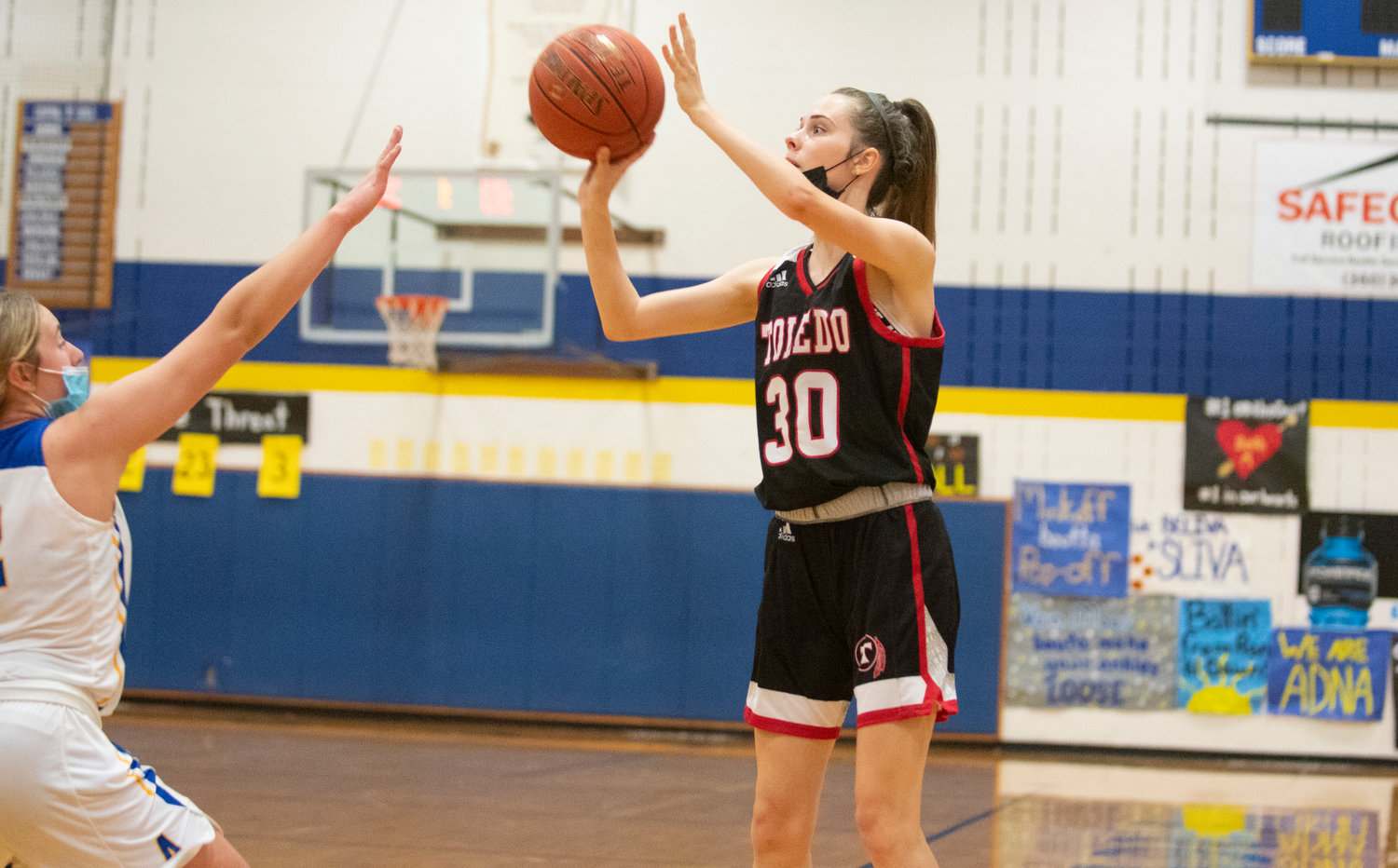 Toledo junior Marina Smith (30) drills one of her five 3-pointers on the day against Adna on Thursday.