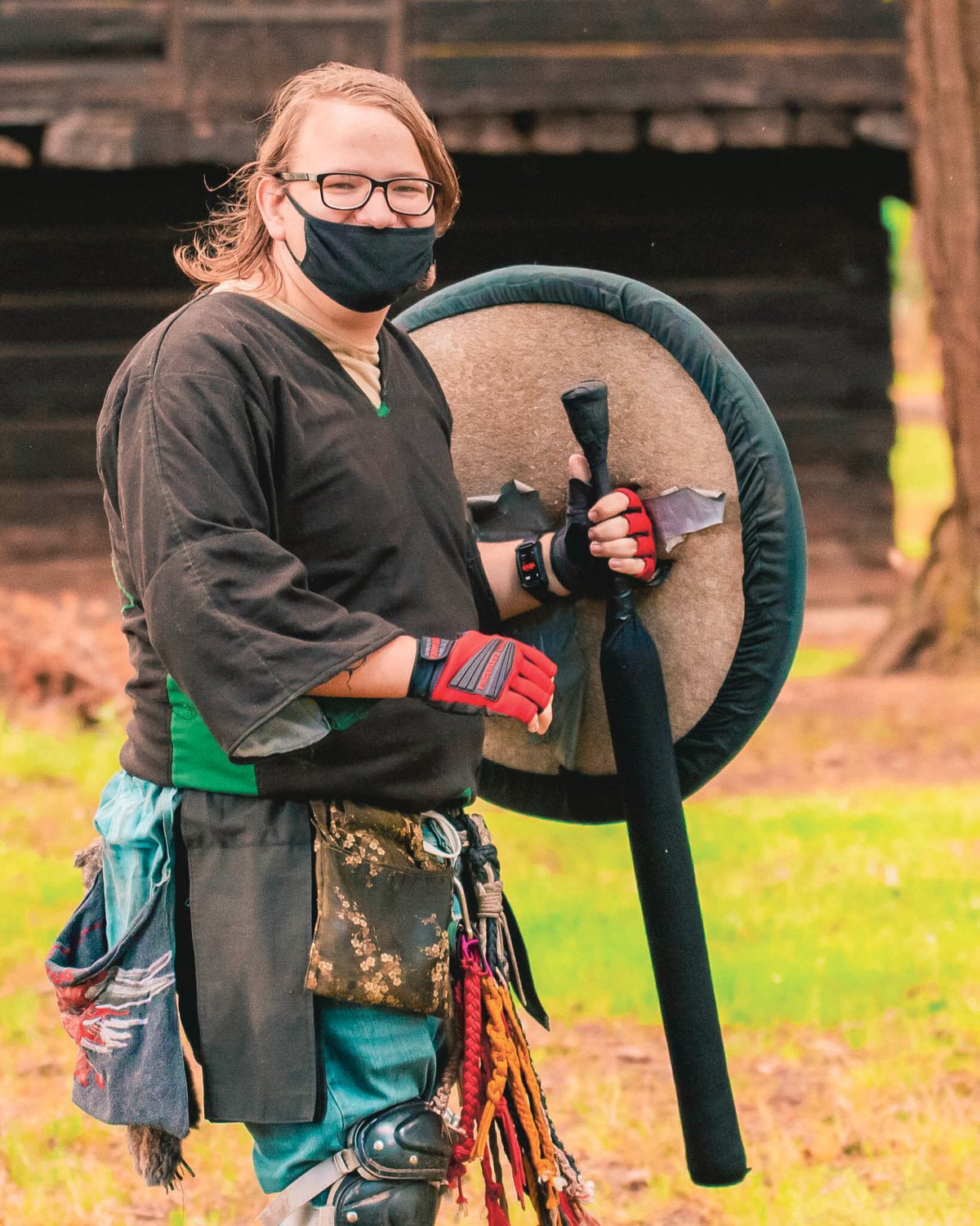 Colton Staggs sports a mask and shield during a live action role play event at Fort Borst Park in Centralia. It is the first time the group has met since the start of the pandemic.