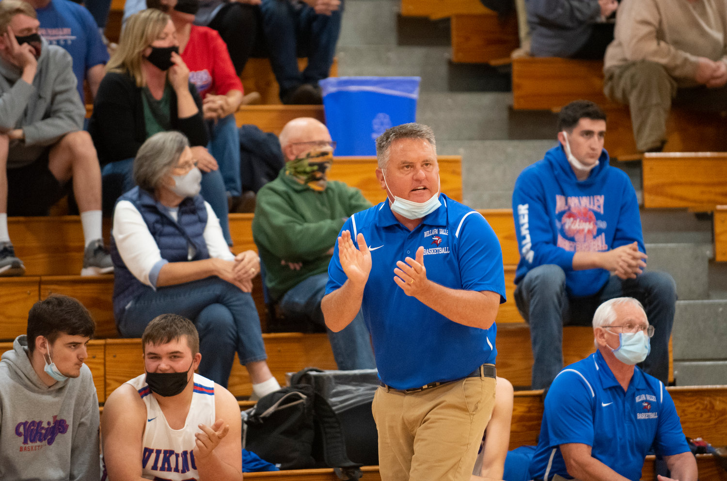 Willapa Valley coach Jay Pearson cheers his team on against Mossyrock on Monday.