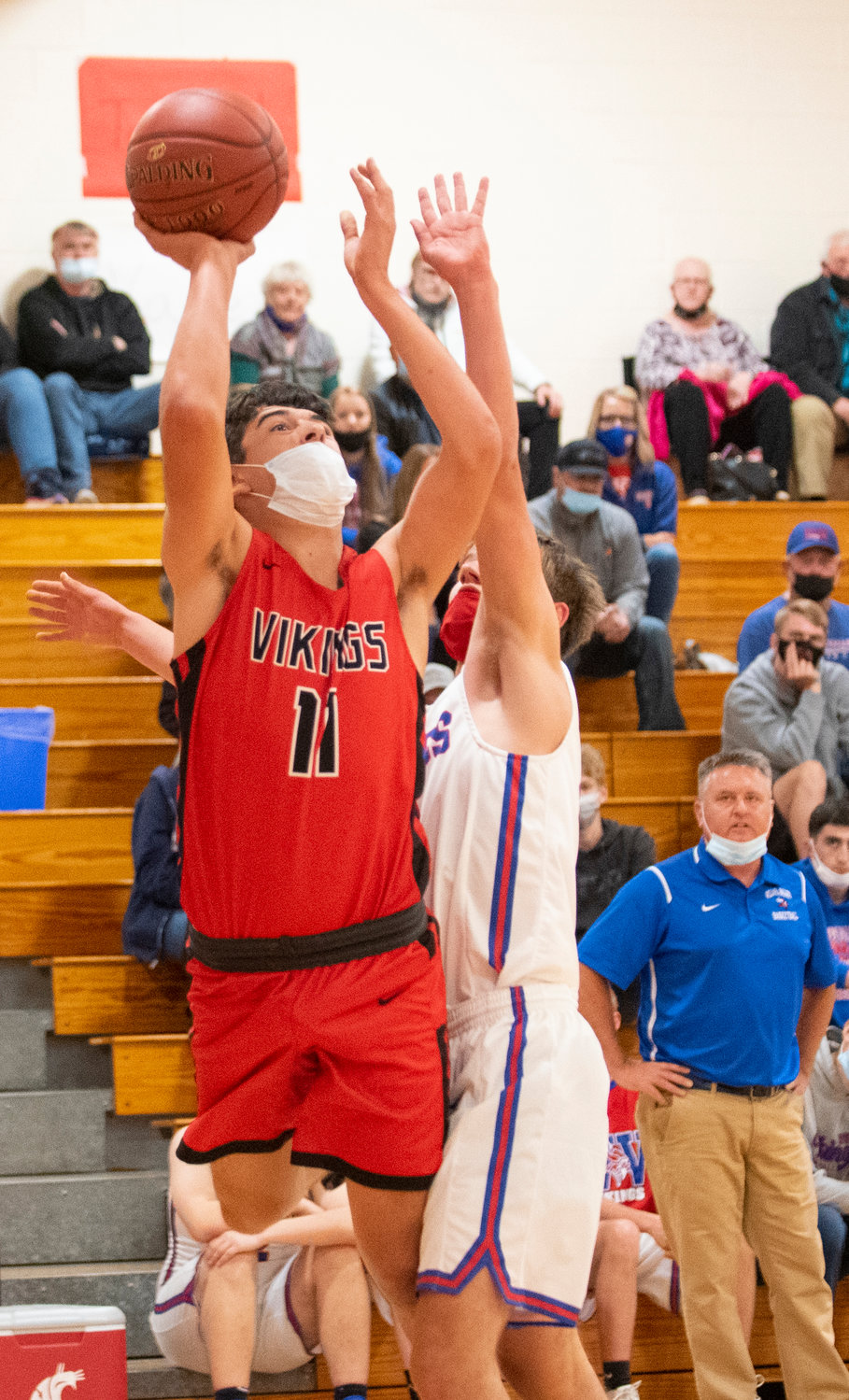 Mossyrock freshman Zach Munos (11) throws up a shot in the paint against Willapa Valley on Monday.