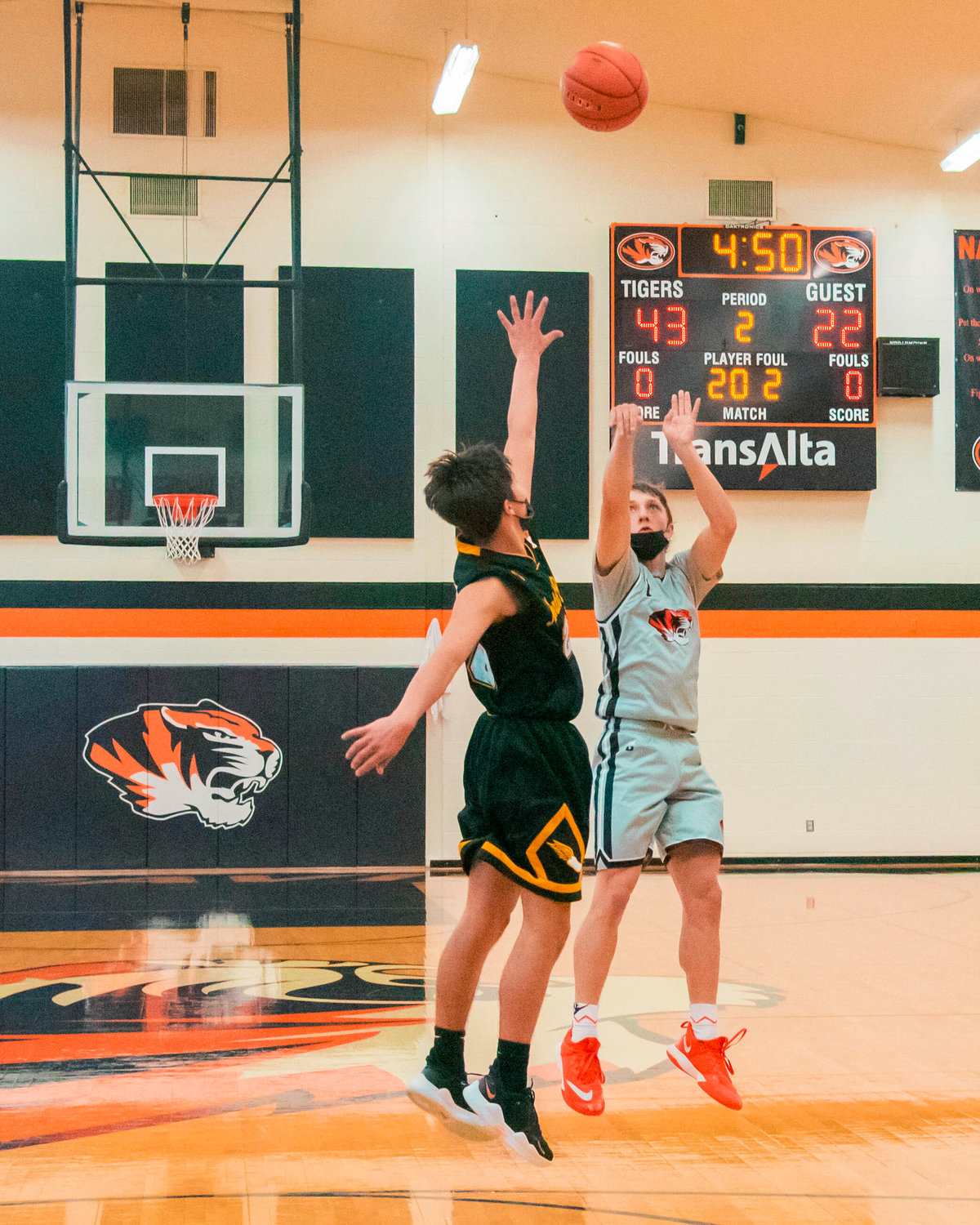 Napavine’s Laythan Demarest (1) shoots over a defender during a game against North Beach on Monday.