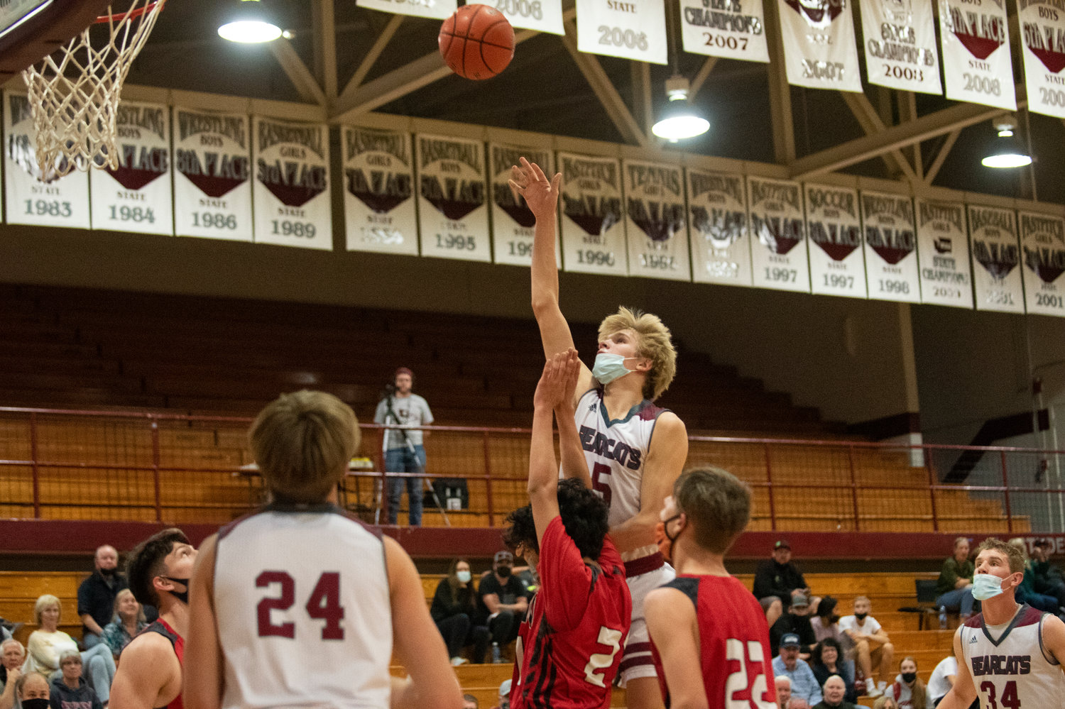 W.F. West junior Dirk Plakinger (5) throws up a floater over Shelton's defense in the district quarterfinals on Tuesday at home.