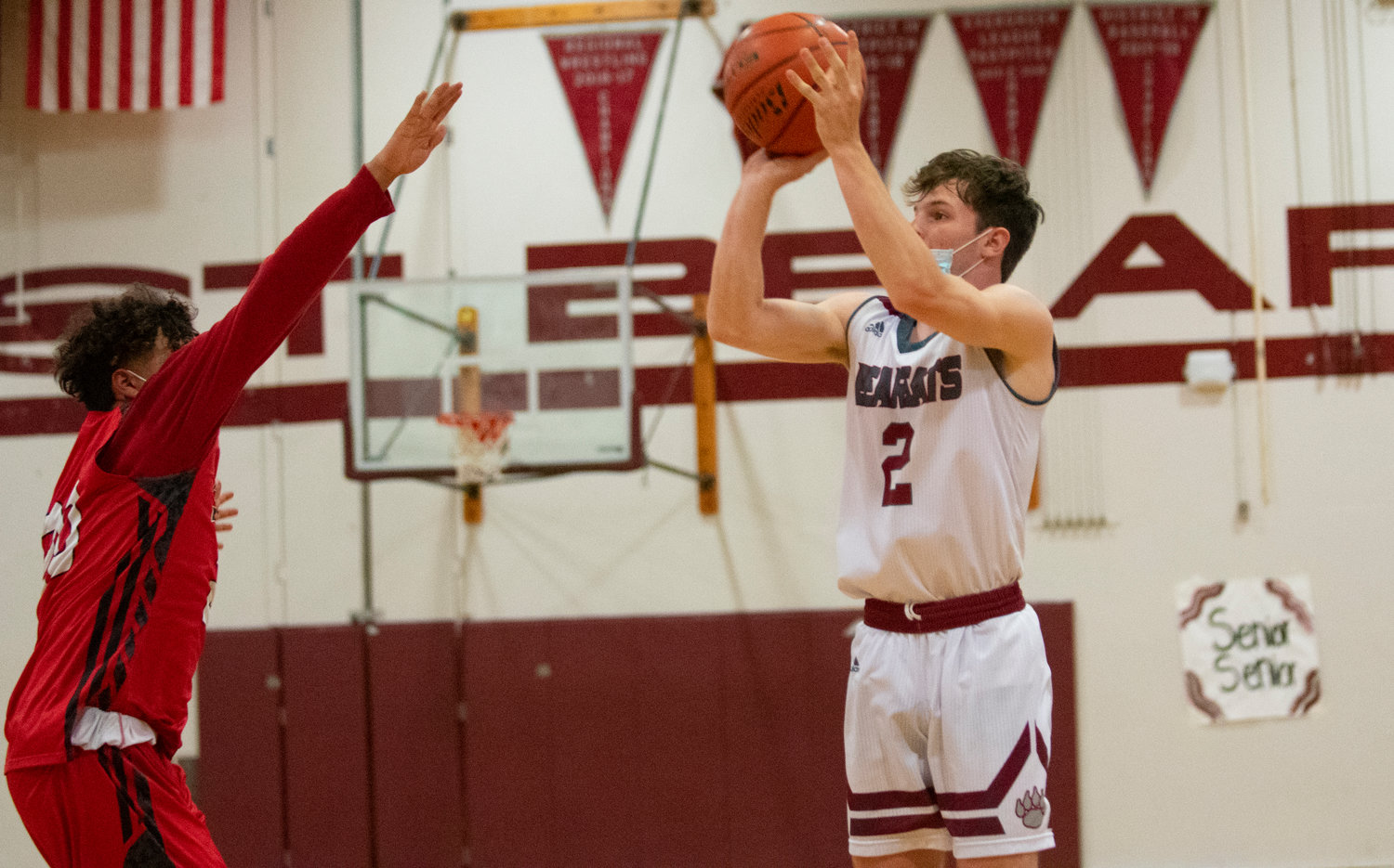 W.F. West senior Max Taylor shoots a 3-pointer over a Shelton player on Tuesday.