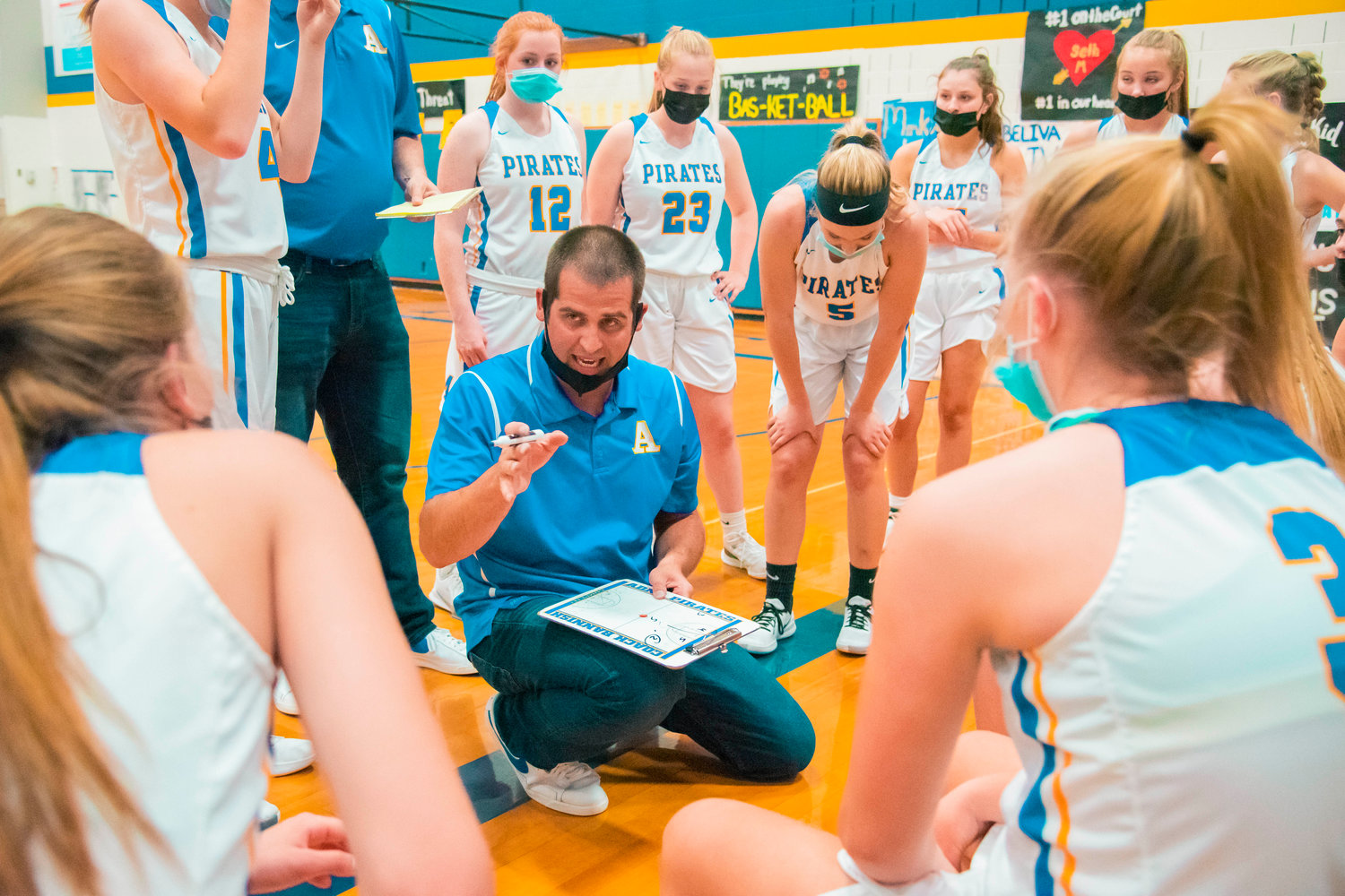 Adna coach Chris Bannish talks to players during a game against Napavine on Tuesday.