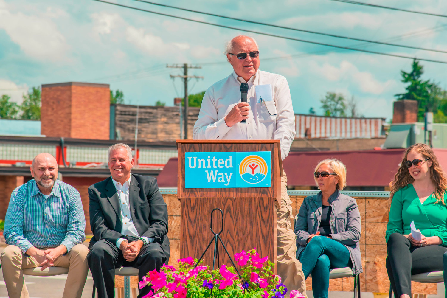 Larry McGee, board president of Discover! Children's Museum, talks to attendees during a groundbreaking event for the United Learning Center on Tuesday in Centralia.