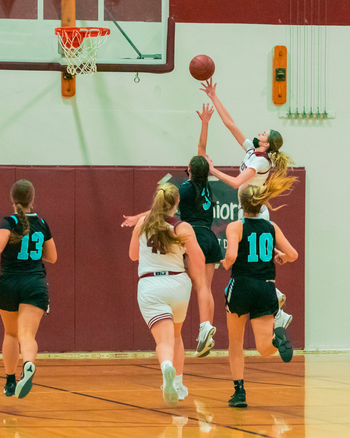 W.F. West's Drea Brumfield (13) goes in for a layup Wednesday night in Chehalis.