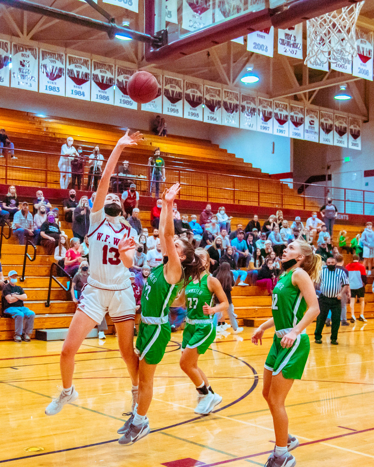 W.F. West’s Drea Brumfield (13) goes in for a layup during a game against Tumwater Thursday evening in Chehalis.