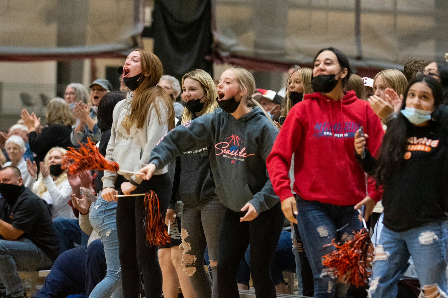 Napavine's student section cheers on the Tigers during the district title match Thursday.
