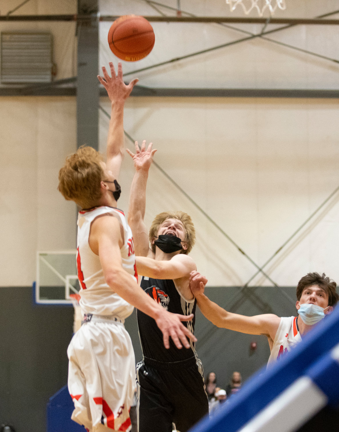 Napavine's Cael Stanley throws up a floater over a Kalama defender on Thursday.