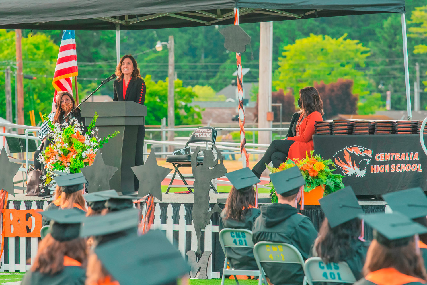 Dr. Lisa Grant talks to graduating students during a ceremony held Friday night in Centralia at Tiger Stadium.