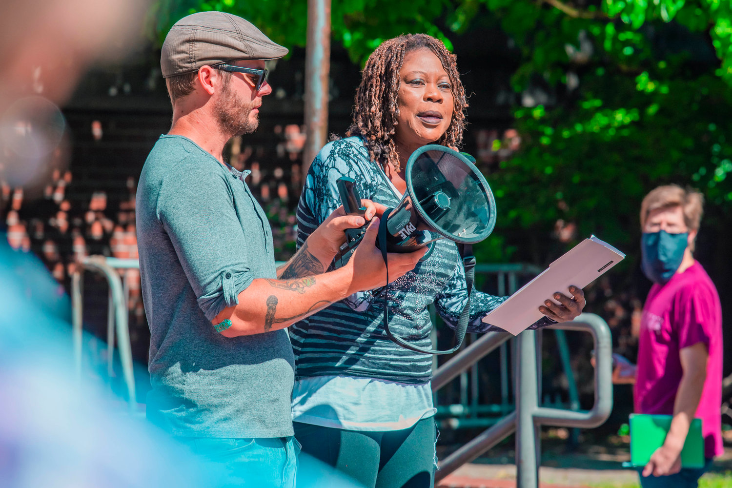 Sarah Brown, the Washington State Area Coordinator with Amnesty International, recites Maya Angelou's "Still I Rise,” during Juneteenth celebrations at George Washington Park on Saturday.