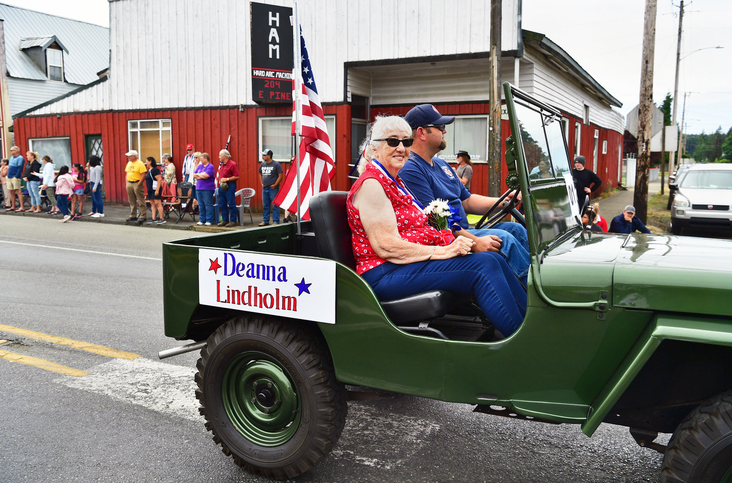 Deanna Lindholm, a longtime Oakville resident and community leader, led Oakville’s Independence Day parade as grand marshal on Saturday, July 3.