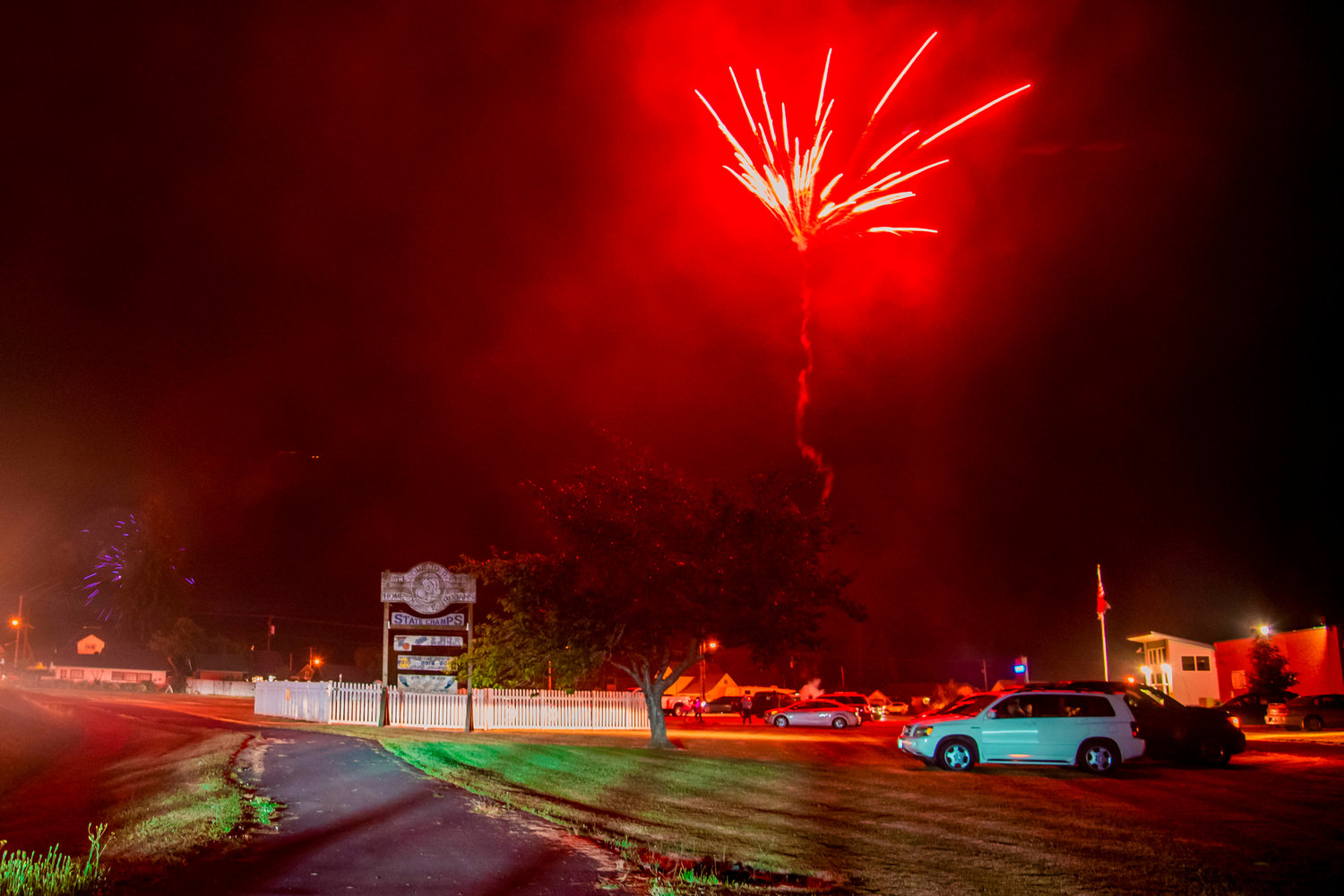 Fireworks explode around the city following a Fourth of July display at the Pe Ell School Sunday night.