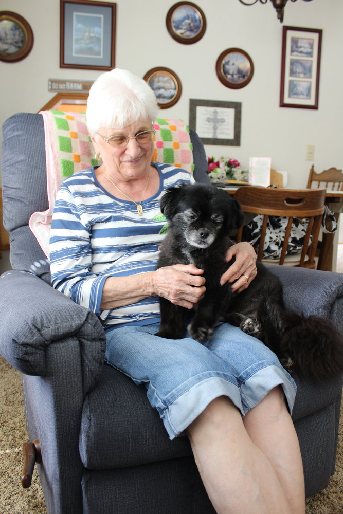 Carol Lee Rickard has lived at Stillwaters since 2005 and said while she partakes in some of the community's many activities, she has met most of her friends walking her dog, Baxter, around the neighborhood.