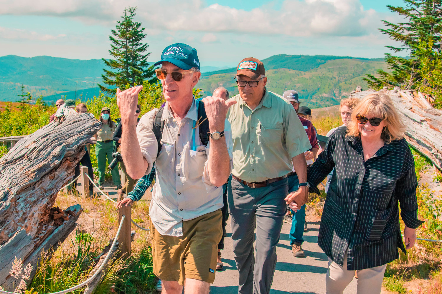 Bill Nye talks about trees blown over as a result of the Mount St. Helens eruption during a walk with Jay and Trudi Inslee along Johnston Ridge.