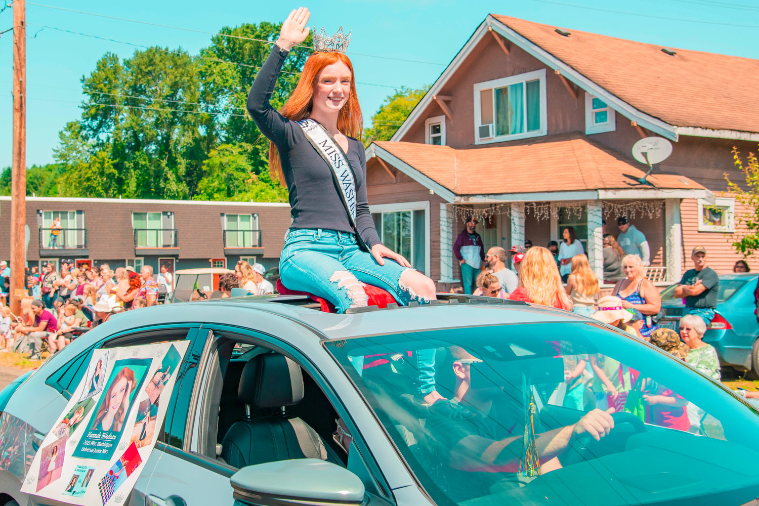 2021 Miss Washington Universal Hannah Bilodeau waves from a vehicle Saturday during the Toledo Cheese Days Parade.