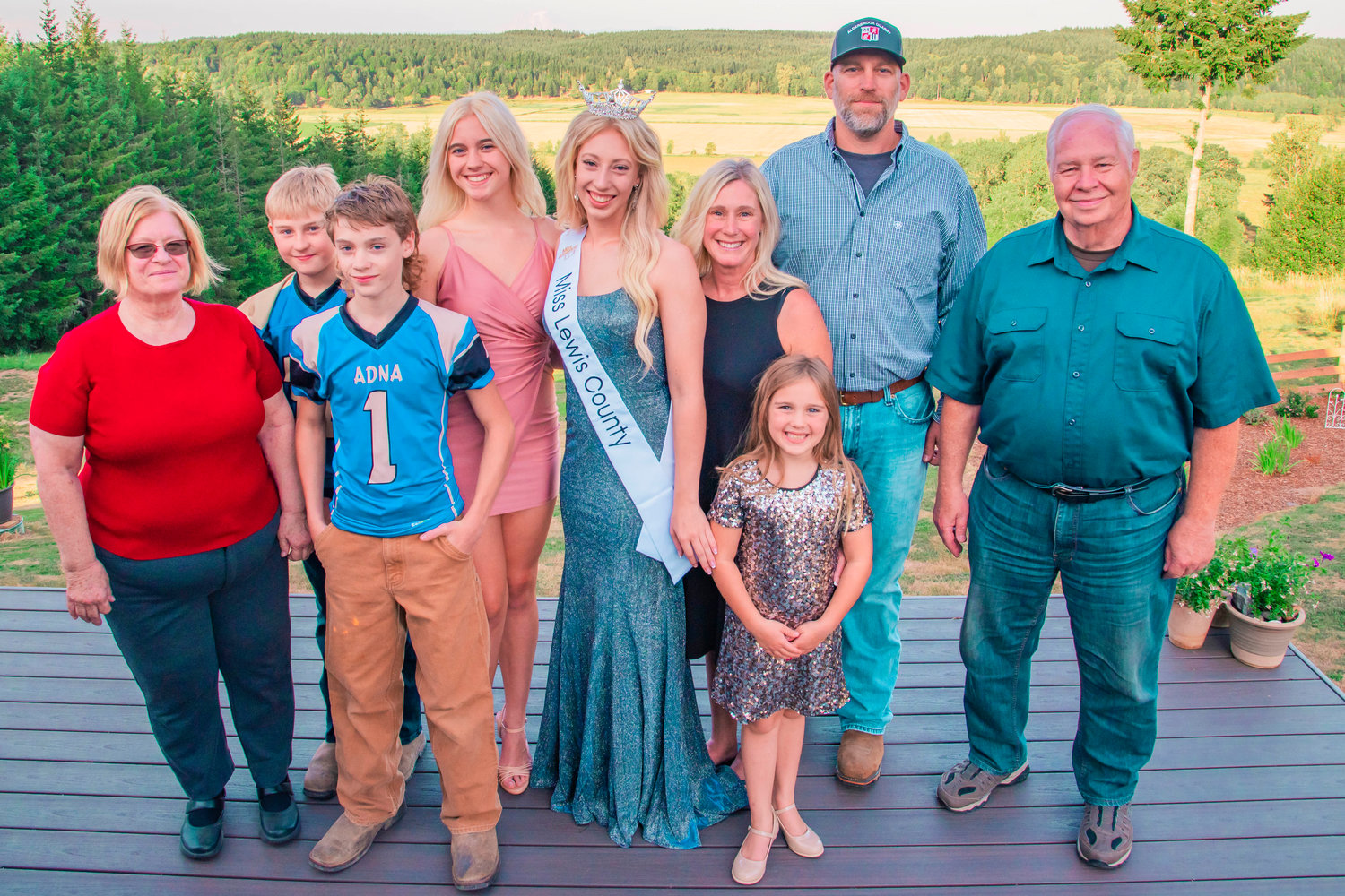 Sophie Moerke, crowned Miss Lewis County, poses for a photo with family following a ceremony in Chehalis on Monday.